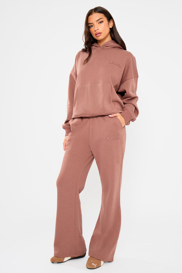 Kaiia Embossed Bubble Logo Flared Joggers Nutmeg