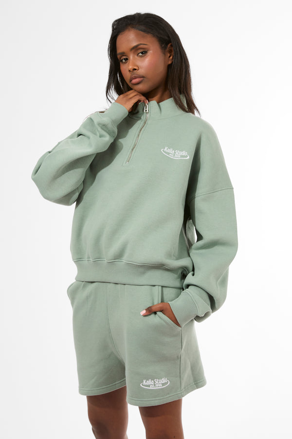 Kaiia Running Club Logo Quarter Zip Sweatshirt Green Tea