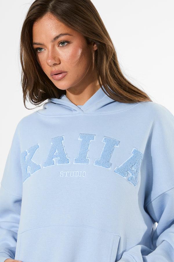 Kaiia Studio Borg Slogan Oversized Hoodie Light Blue