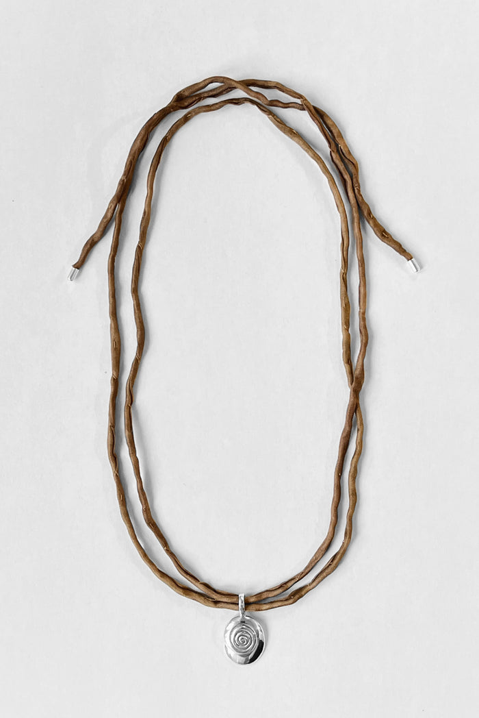 kara yoo jewelry Sand Nautilus on Raw Silk