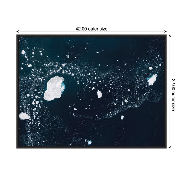 Kate & Laurel Sylvie Blue And White Iceberg Pattern In Greenland Framed Canvas By Michael Schauer