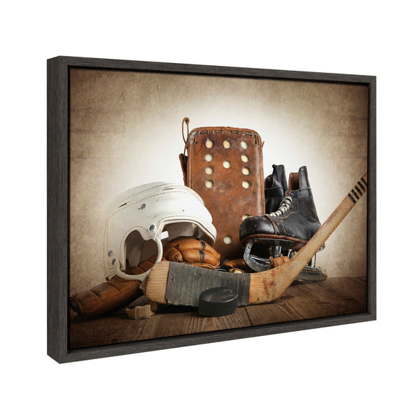 Kate & Laurel Sylvie Hockey Gear Framed Canvas By Shawn St. Peter