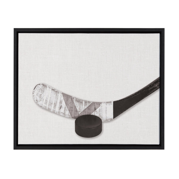 kate & laurel Sylvie Horizontal Hockey Stick And Puck Portrait Framed Canvas Black 18x24
