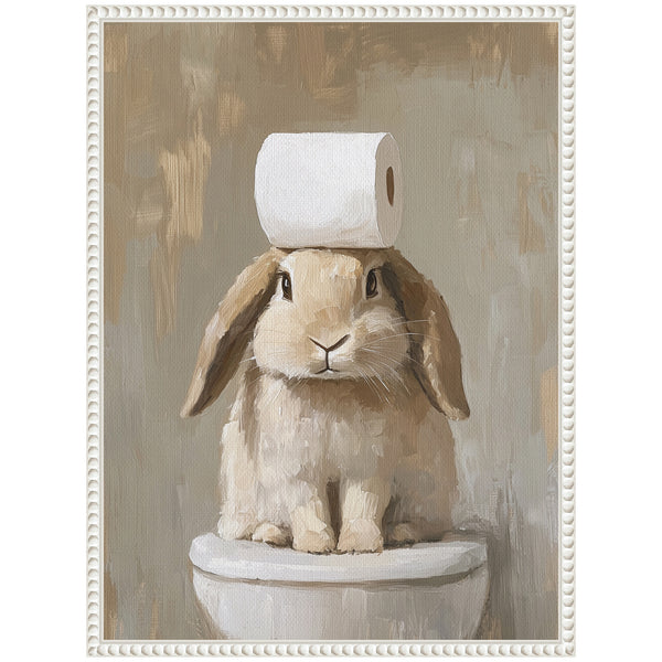 Kate & Laurel Sylvie Toilet Paper Roll On Cute Bunny Head Bathroom Art Framed Canvas By The Creative Bunch Studio