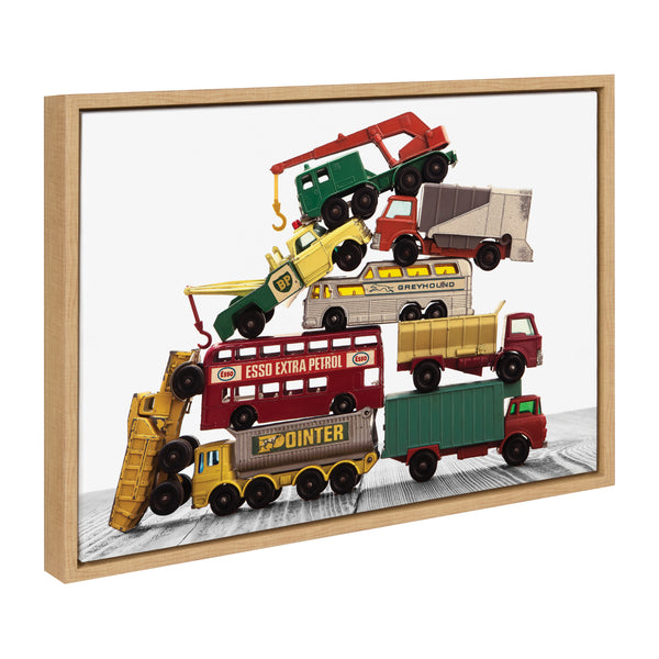 kate & laurel Sylvie Vintage Stacked Matchbox Work Vehicles Pile Framed Canvas by Saint and Sailor Studios