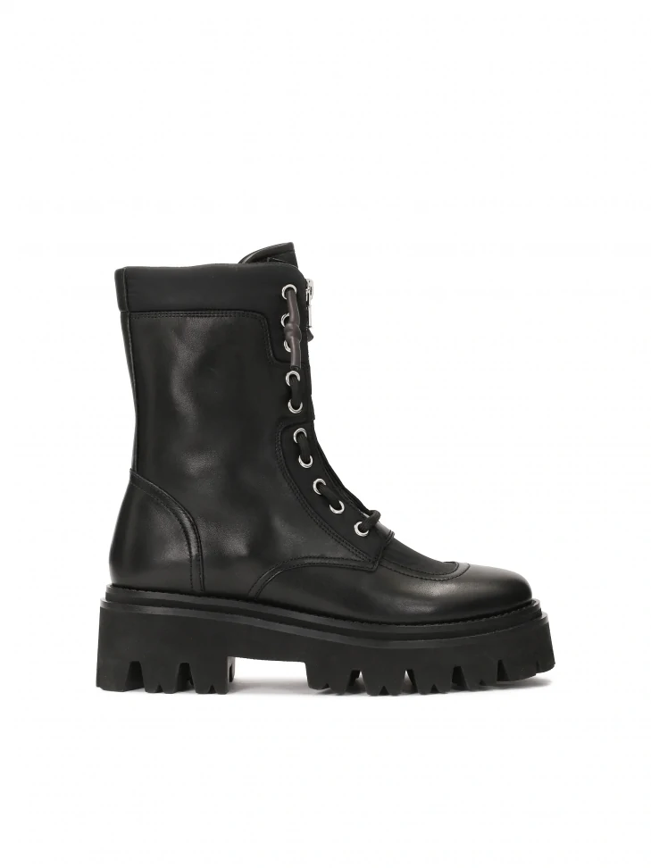 kazar Black boots with a high upper on a trefoil sole