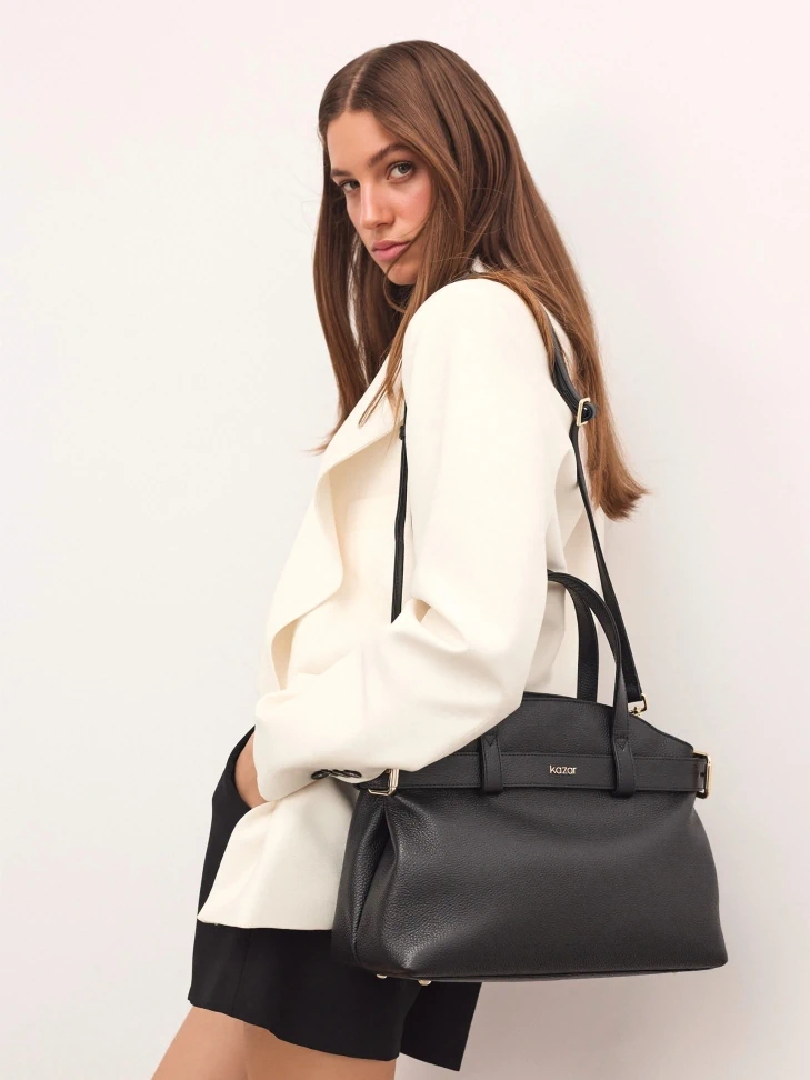 Kazar Black Leather Handbag With Decorative Strap And Functional Interior