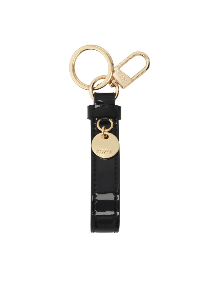 kazar Black patent leather key ring with gold accents and KAZAR logo