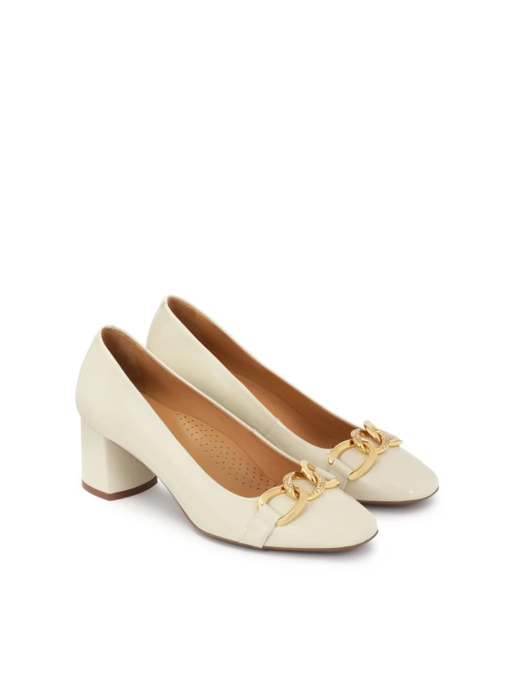 Kazar Cream Patent Leather Pumps With Metal Embellishment