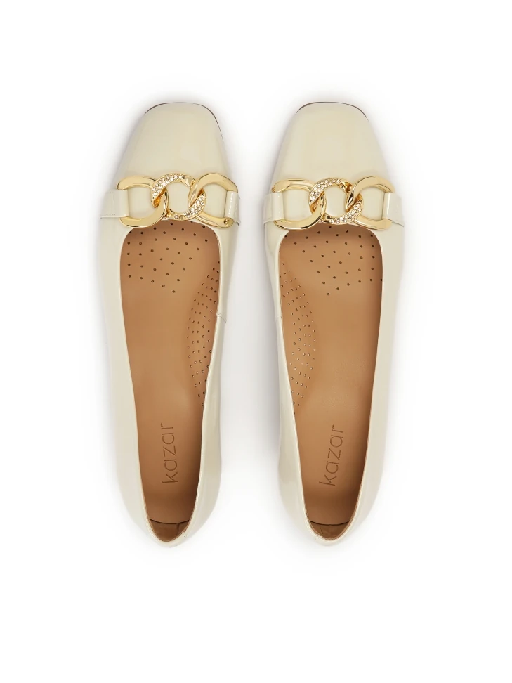 Kazar Cream Patent Leather Pumps With Metal Embellishment