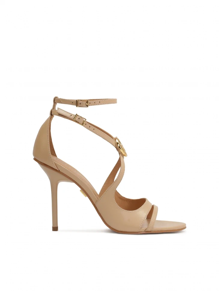 kazar Elegant heeled sandals with criss-crossing straps and KAZAR monogram