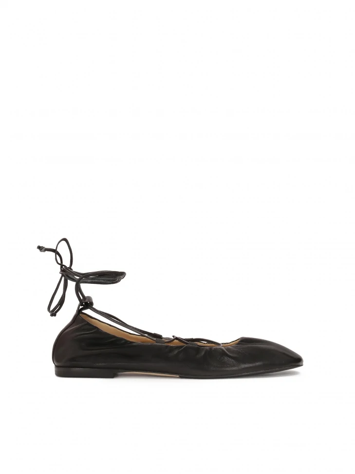 kazar Black ballerinas tied around the ankle
