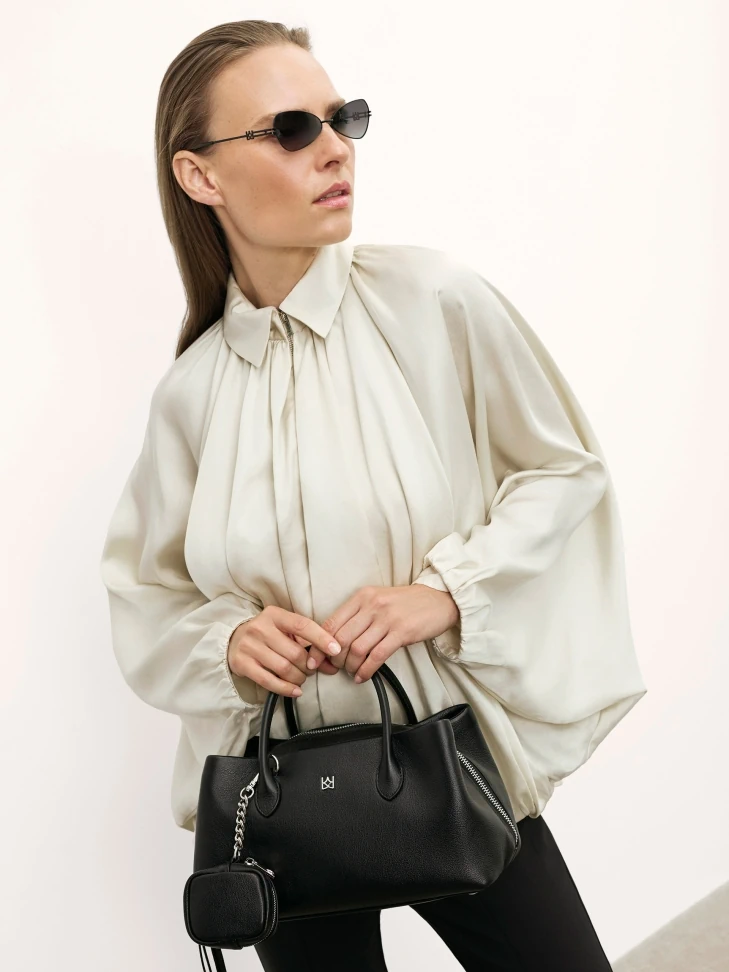 kazar Black handbag with a unique shape