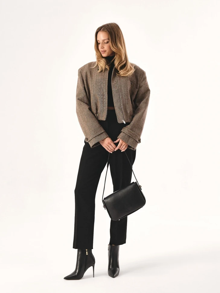 Kazar Black Handbag With Striking Pinned Strap
