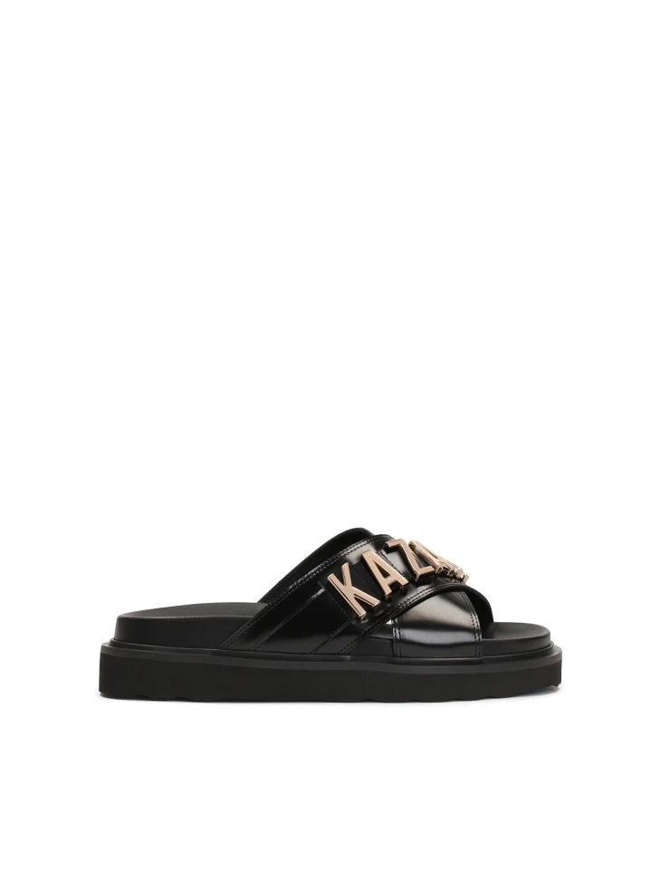kazar Black leather mules with metal lettering