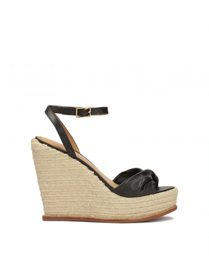 kazar Black leather sandals on a platform