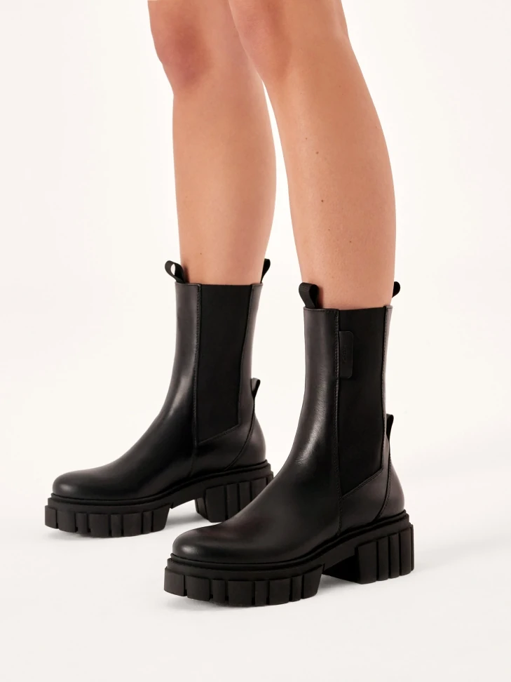 Kazar Black Slip-on Chealse Boots On Trefoil Sole