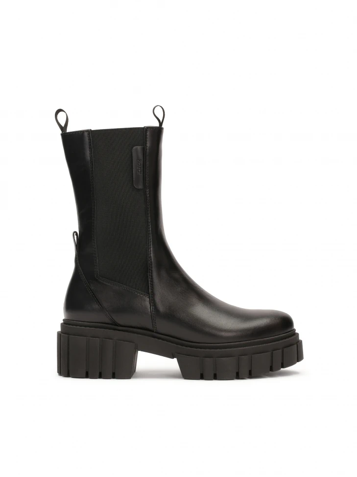 kazar Black slip-on Chealse boots on trefoil sole