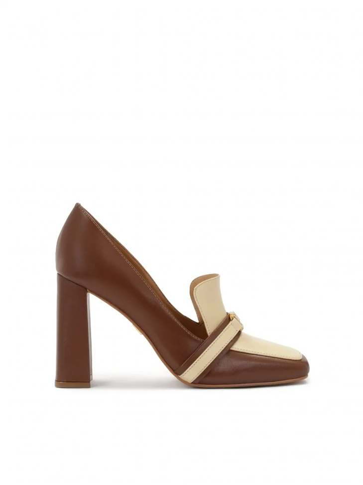 kazar Brown and beige pumps on a post