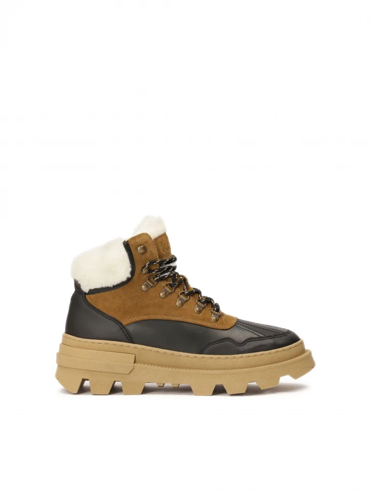 kazar Brown and black boots on a thick sole