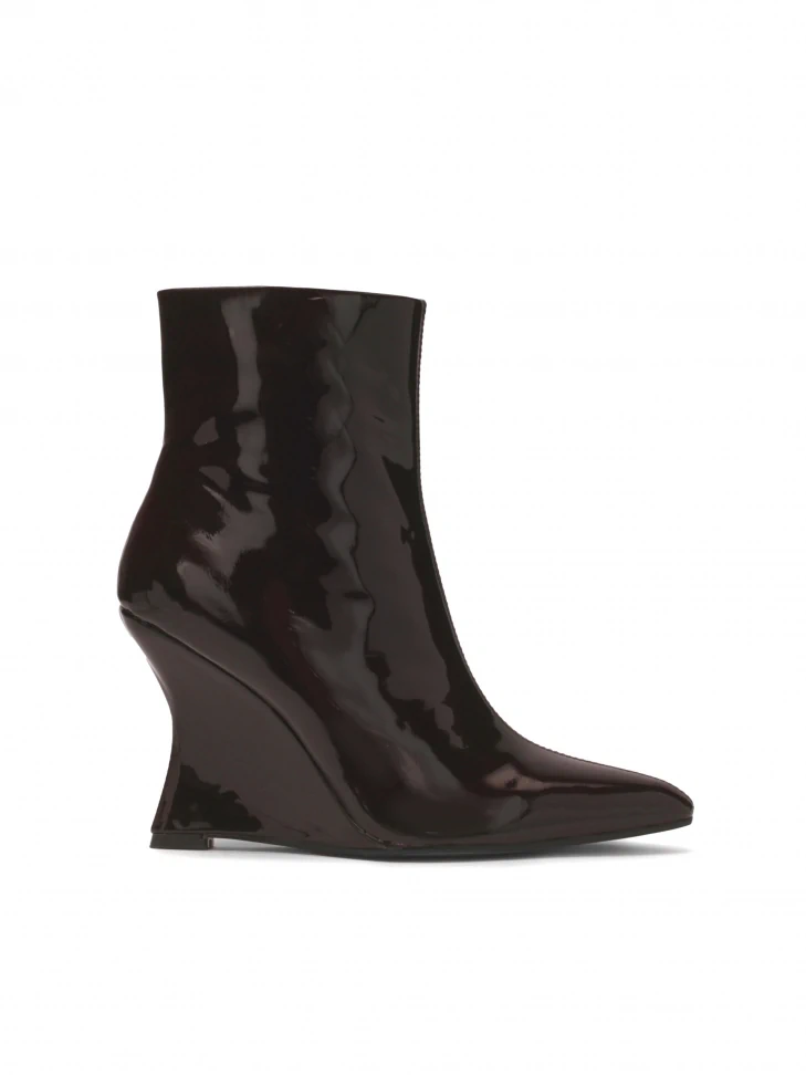 kazar Brown leather boots on a platform heel