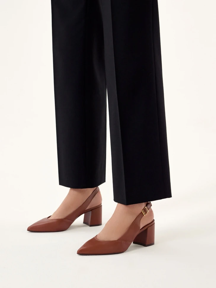 Kazar Brown Pumps On A Post With An Open Heel