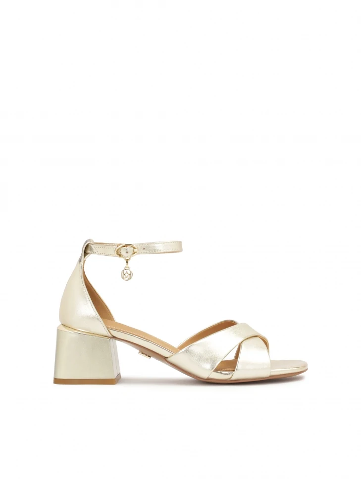 kazar Classic sandals on a low post in gold color