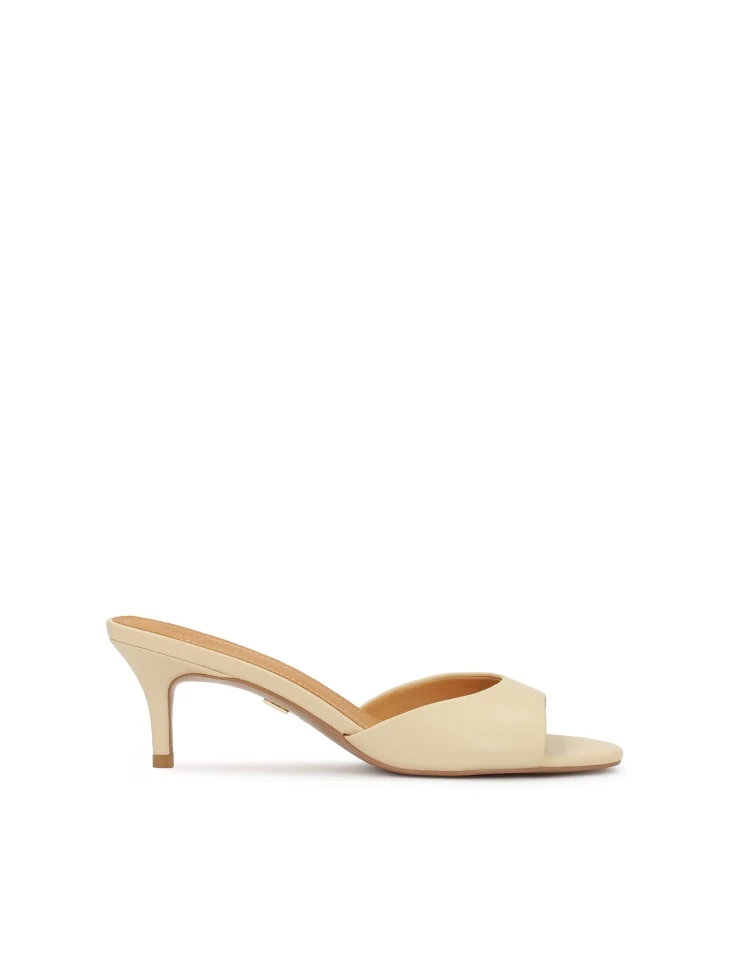 kazar Cream mules on a low stiletto heel