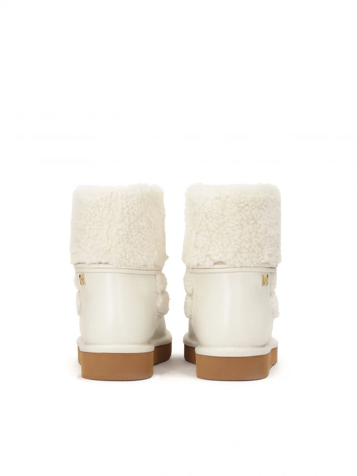 Kazar Cream Snow Boots On A Brown Sole