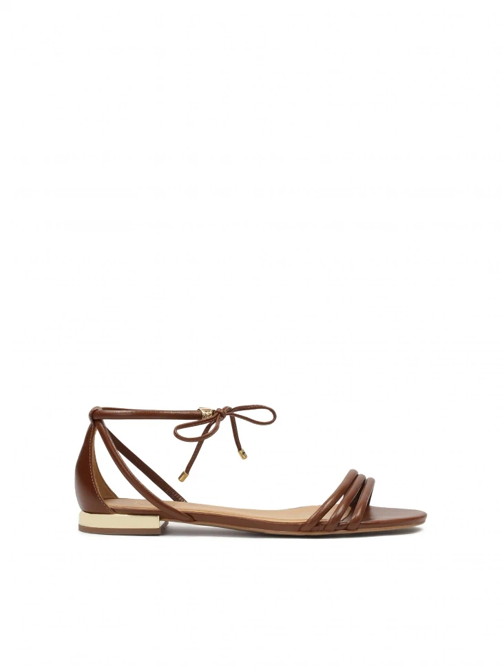 kazar Flat brown sandals tied with a thong