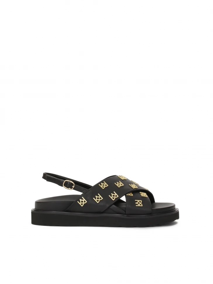 kazar Flat sandals decorated with metal monograms