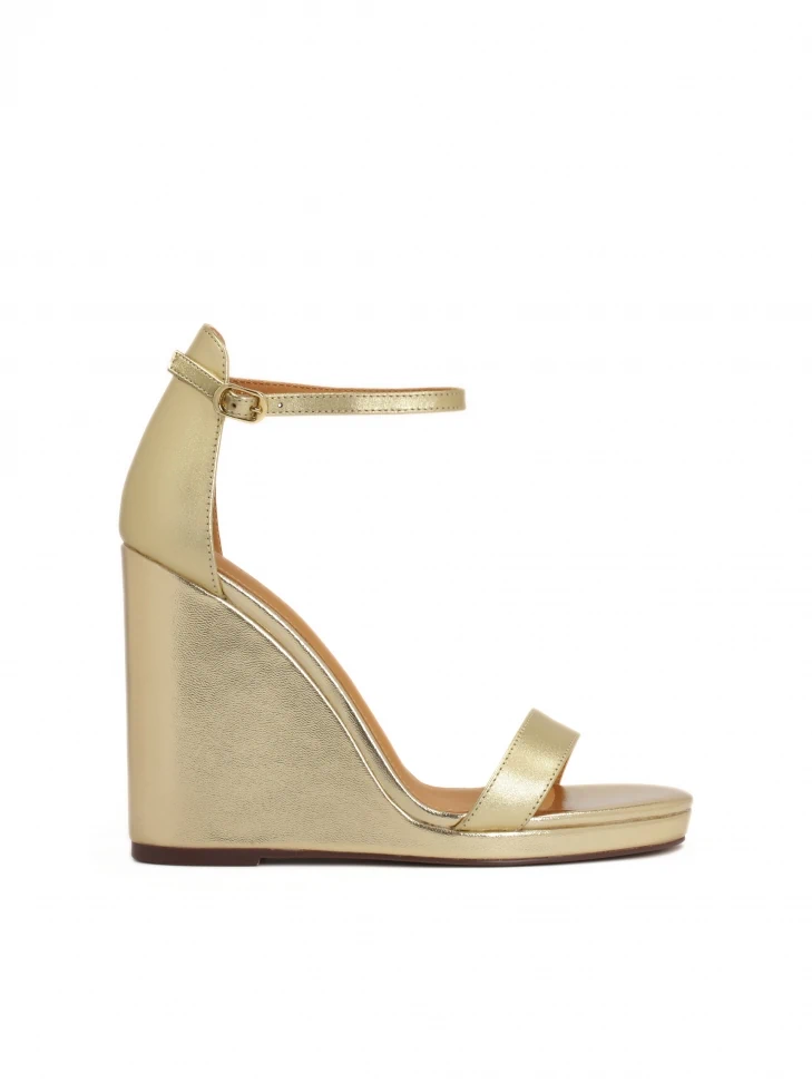 kazar Gold leather sandals on a platform heel