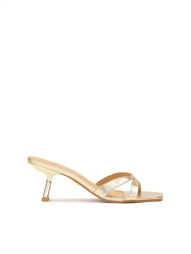 kazar Gold mules with low non-trivial heel