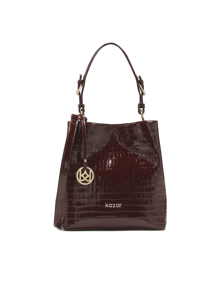 kazar Maroon patent handbag with exotic pattern