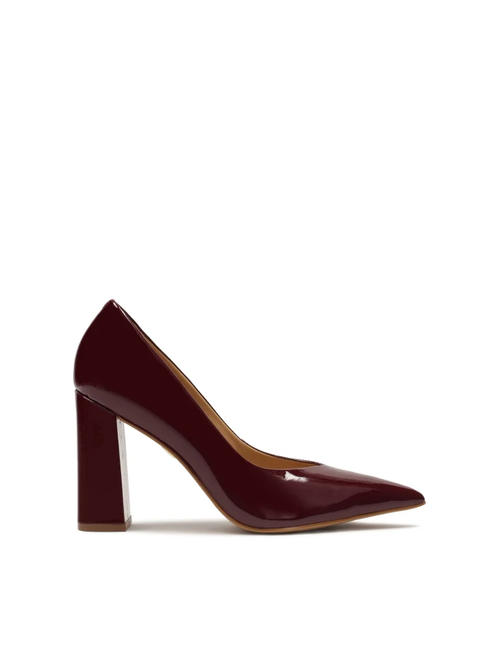 kazar Maroon patent leather pumps with a wide heel