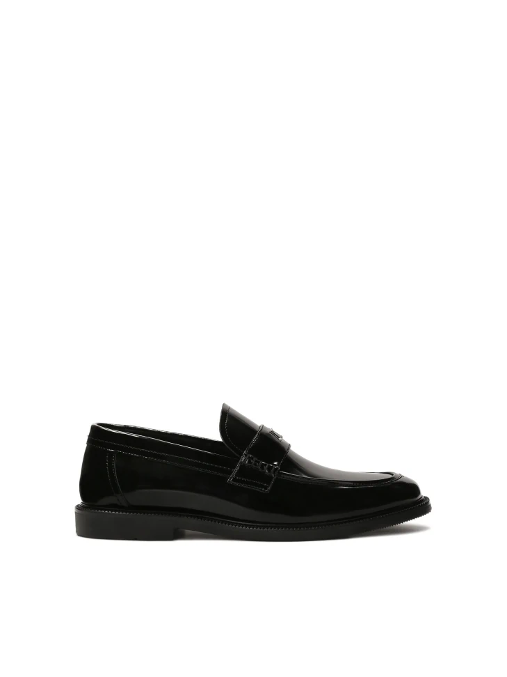 kazar Monogrammed black slip-on loafers