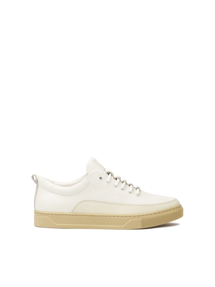 kazar White leather sneakers on a beige sole