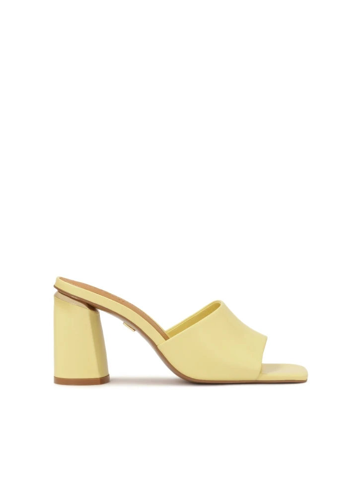 kazar Yellow mules on a block