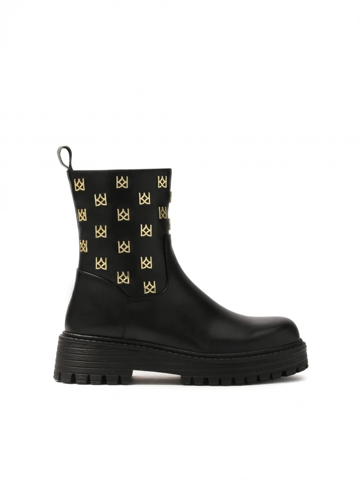 kazar Zipper boots decorated with metal monograms