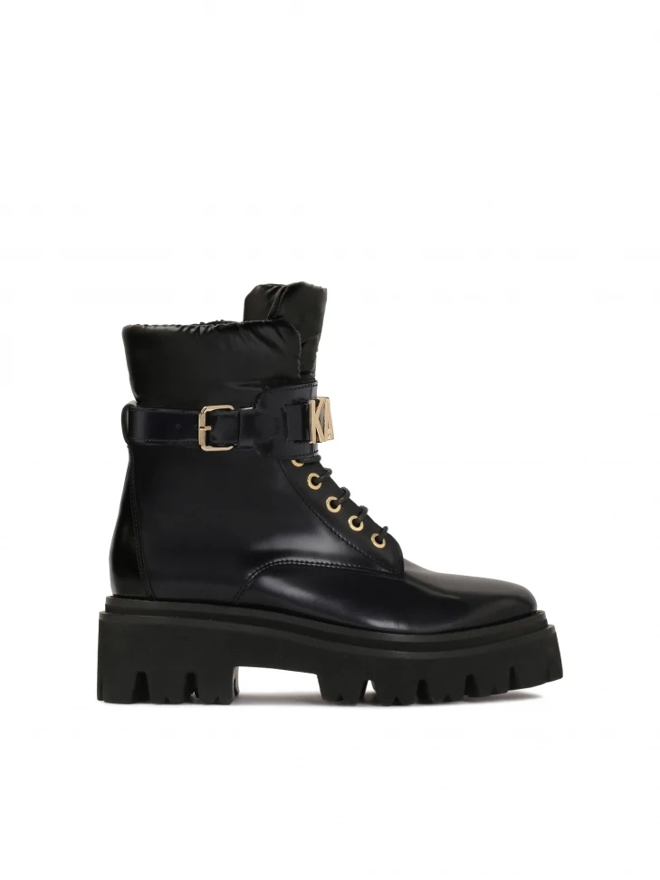 kazar Ladies’ leather flat ankle boots with strap decorated with metal letters