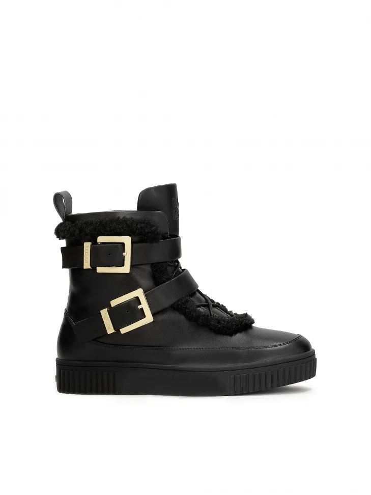 kazar Leather boots decorated with buckles and sheepskin
