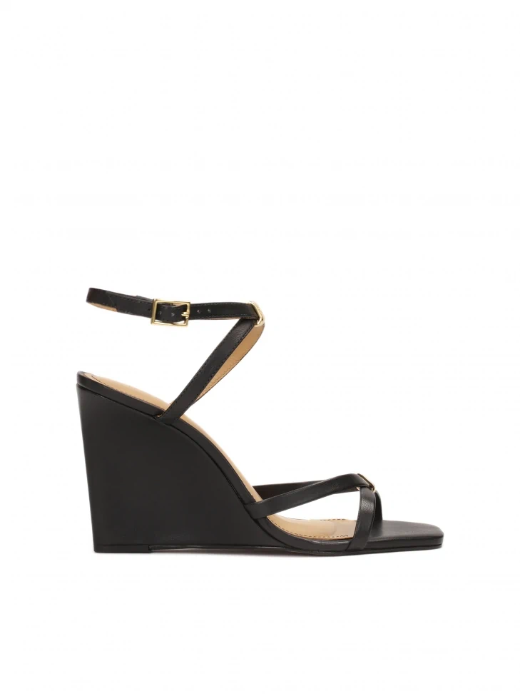kazar Leather sandals on a platform with crossed straps