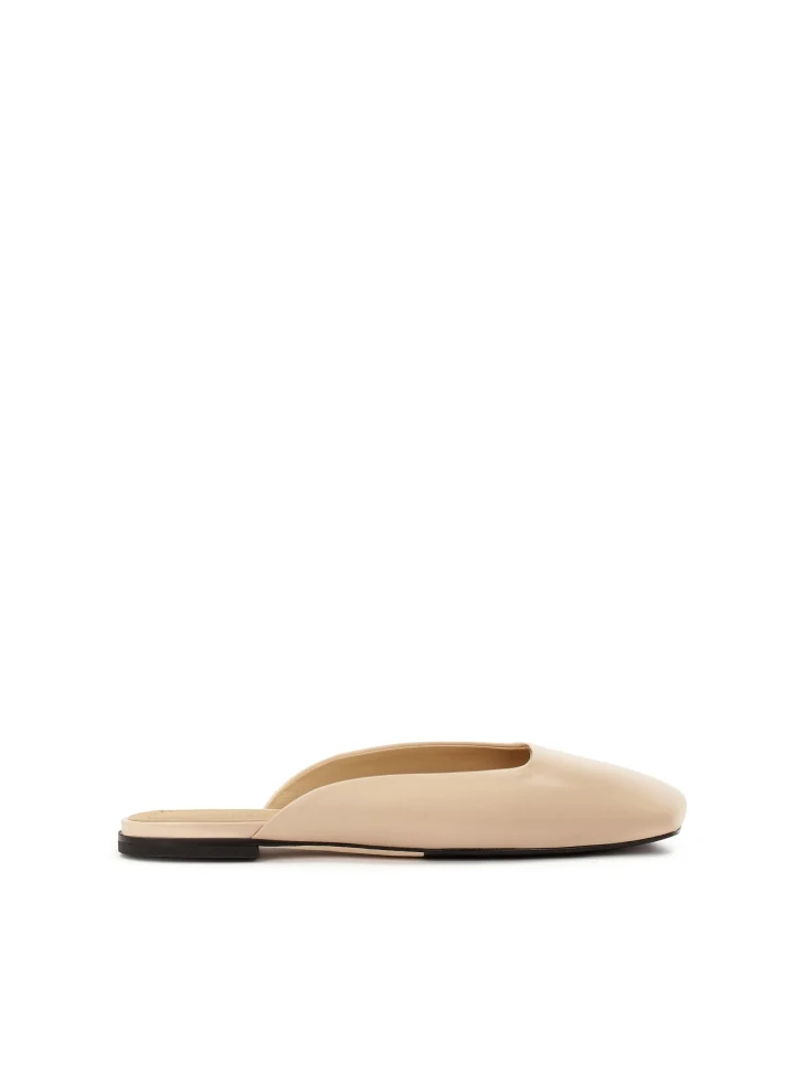 kazar Leather slides on a flat sole with a square front