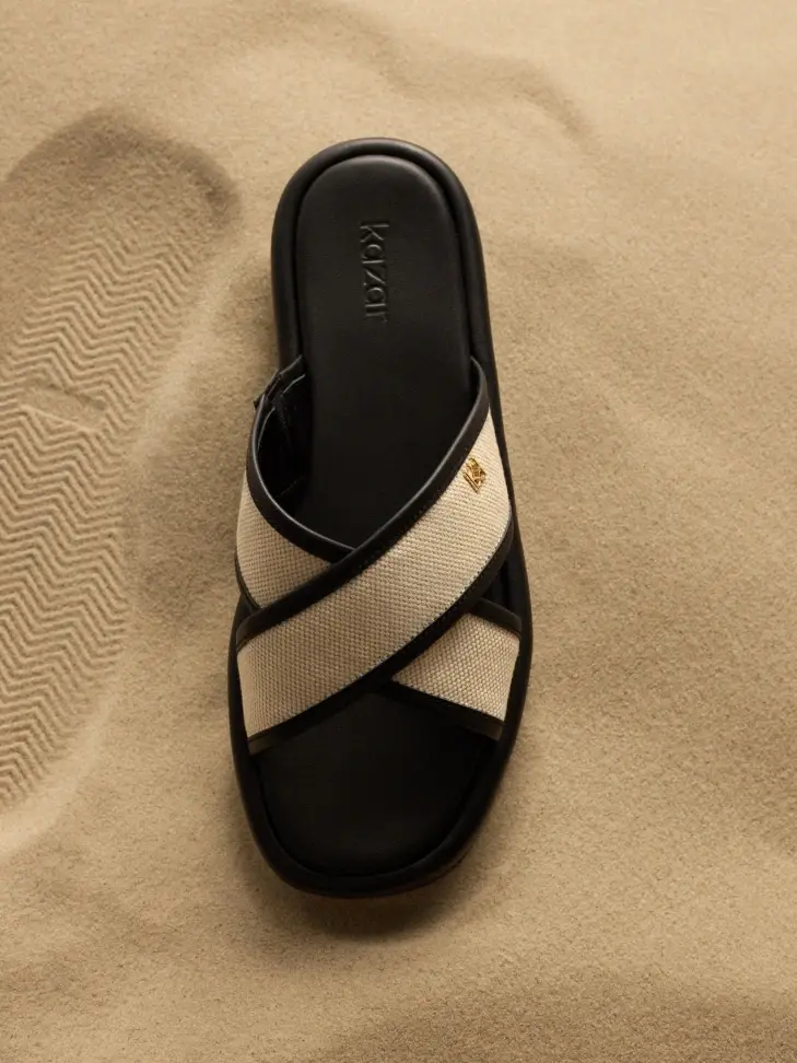 kazar Leather slides on a thick sole with cross straps