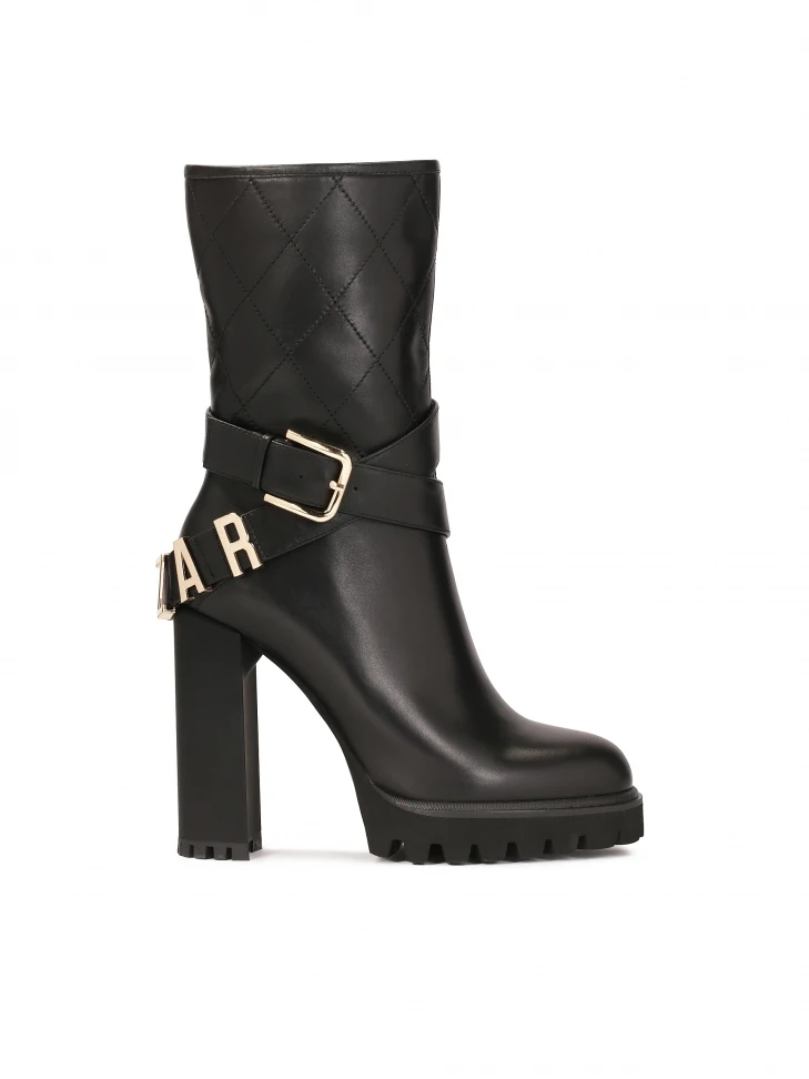kazar Stiletto booties with a logoed strap around the upper