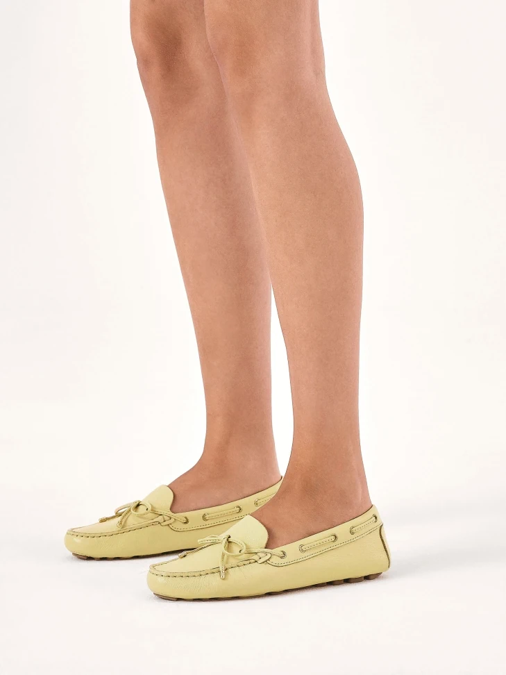 Kazar Yellow Moccasins With A Thong On A Studded Sole