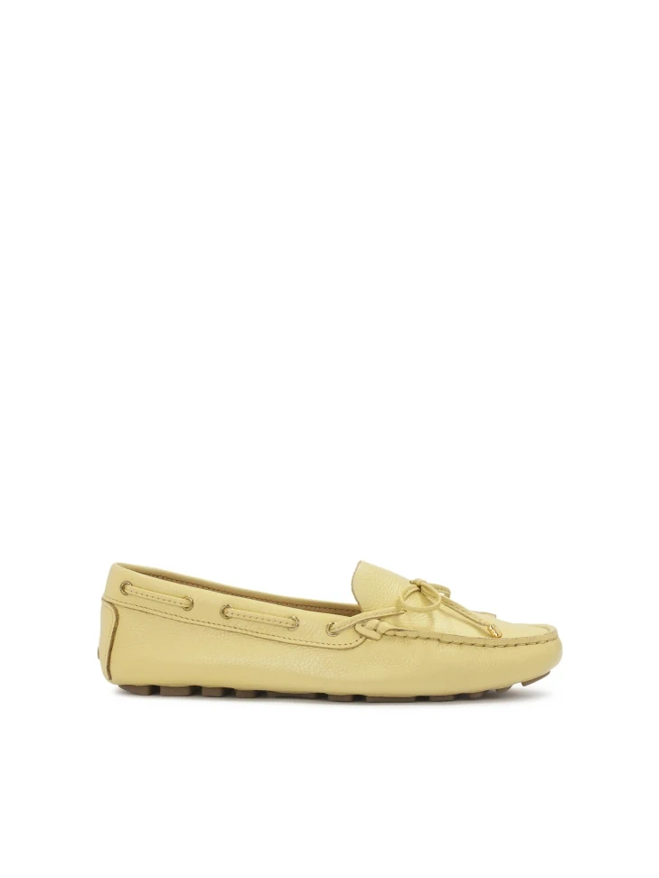 kazar Yellow moccasins with a thong on a studded sole