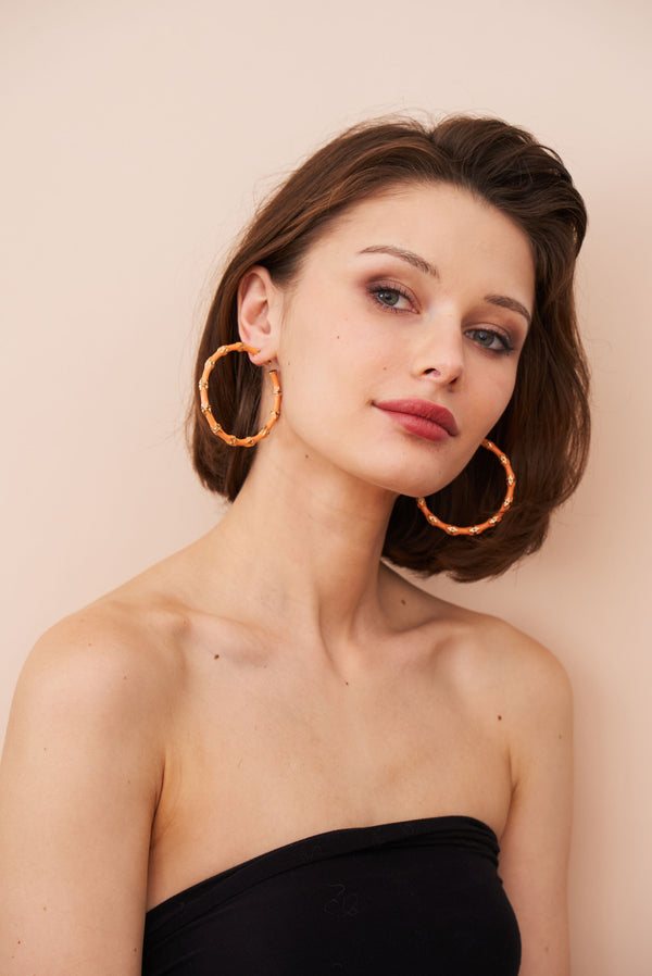 Kenneth Jay Lane Large Coral Bamboo Hoop Earrings