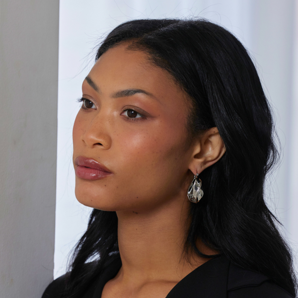 Kenneth Jay Lane Silver Twist Pierced Hoop Earrings