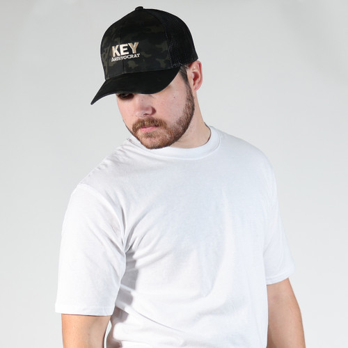 key apparel Golden Aristocrat Camo Trucker Hat